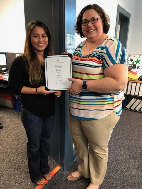 Lemoore Finance Director Heather Corder (right) and Accountant Jenarae Benavente worked on last year's financial report.